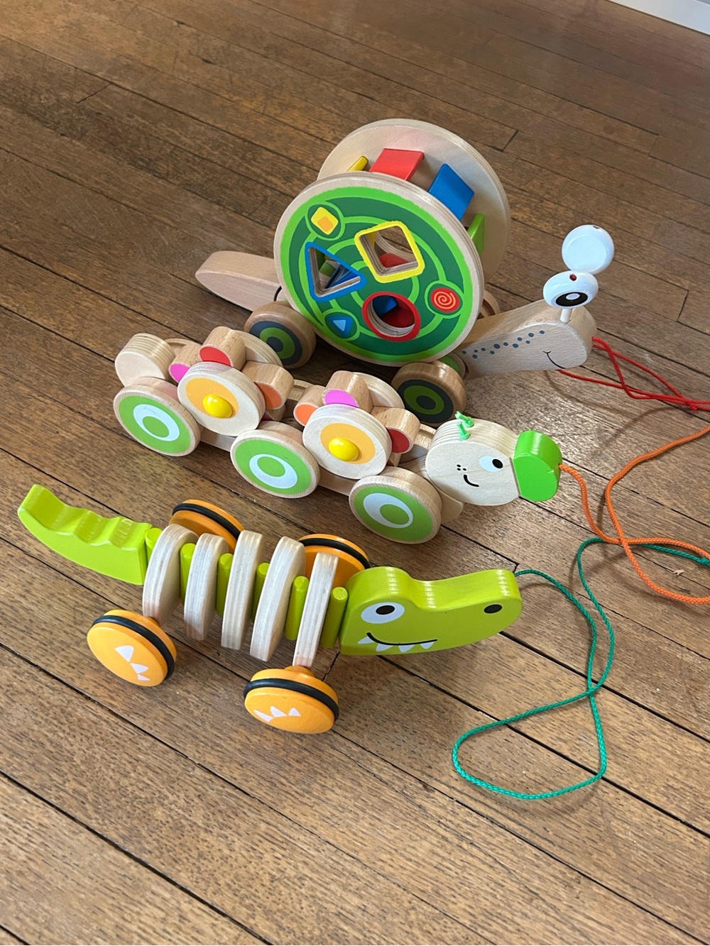 Hape wooden pull toy lot with caterpillar, alligator and snail